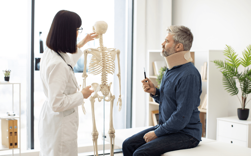 Doctor Consulation with a Whiplash patient